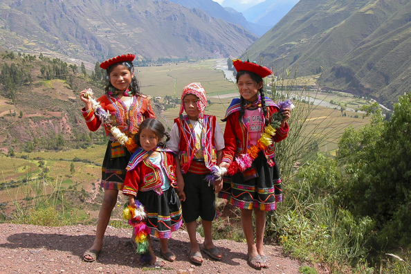Peruvian children brighten up the landscape