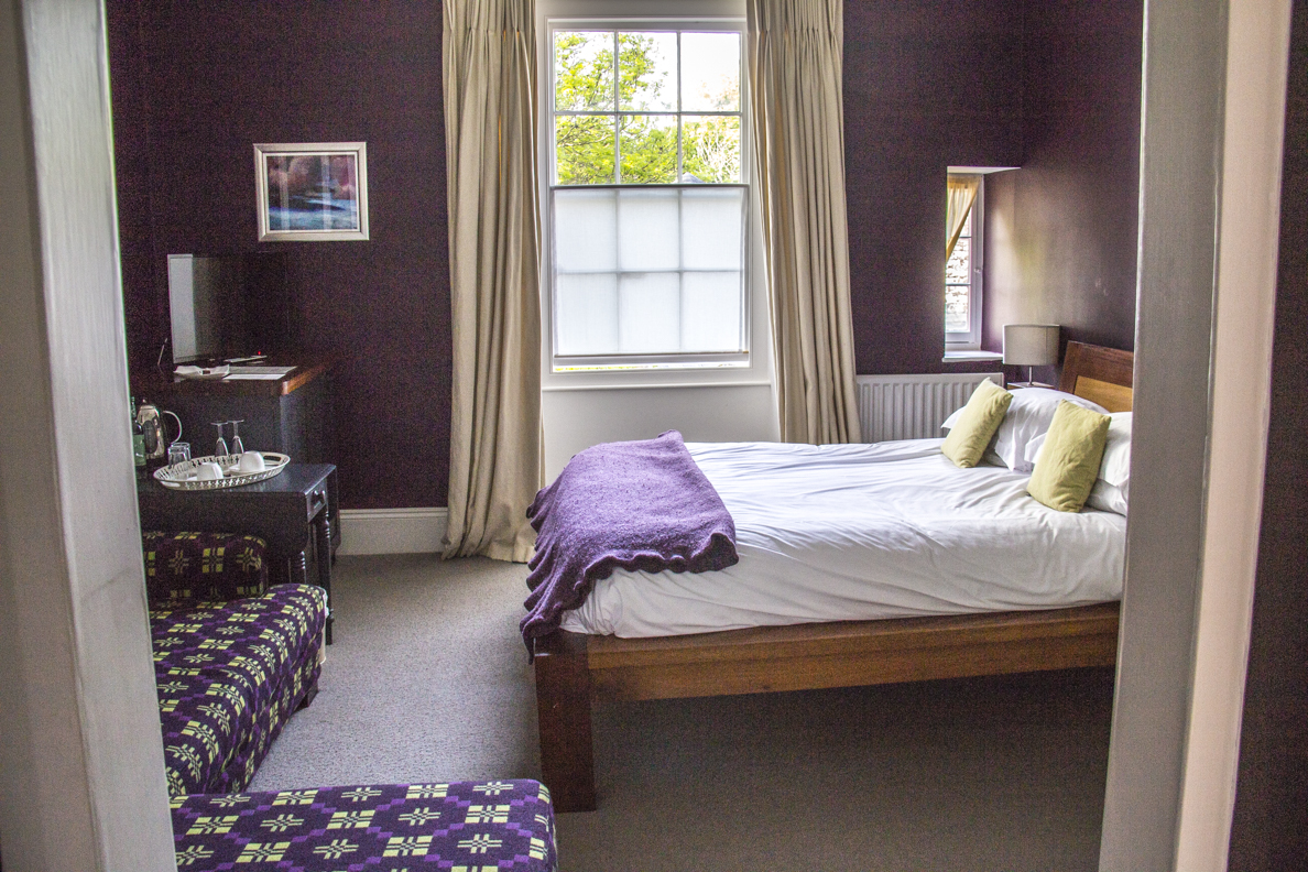 A bedroom at Llys Meddyg in Newport, Pembrokeshire, Wales 8493