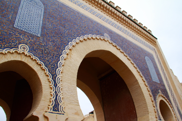 Bab Bouijloud or blue gate at the entrance to the medina in Fez Morocco