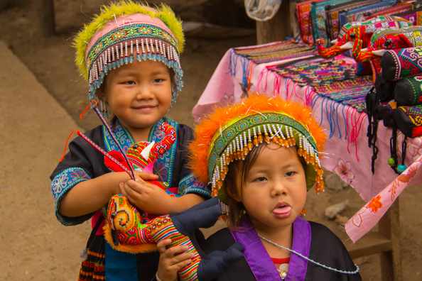 Children selling souvenirs in a Hmong village near Luang Prabang, Laos