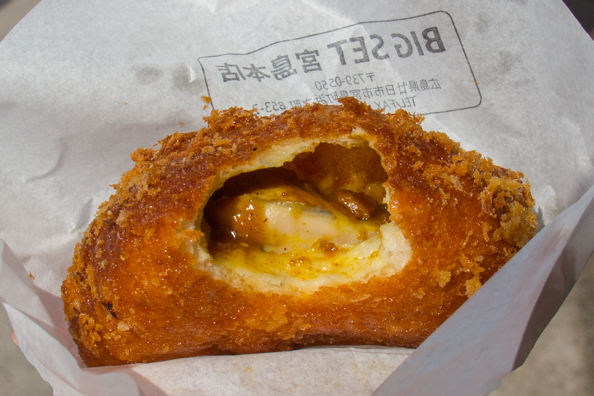 Curry with baked oysters in a baked bun from Miyajima Island in Japan