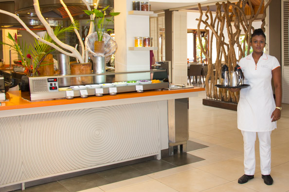 Jaya serving tea and coffee in the Show restaurant at the Tamassa hotel, Bel Ombre on Mauritius