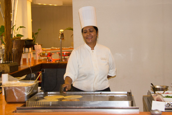 Kavita cooking pancakes in the Show restaurant at the Tamassa hotel, Bel Ombre on Mauritius