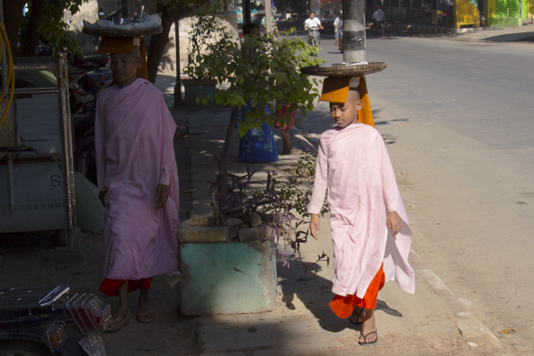 Nuns collecting alms in Mandalay Myanmar