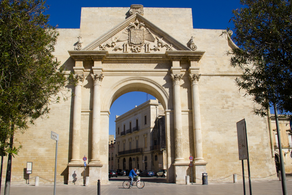 Porta Napoli gate into the old town of Lecce, Puglia, Italy
