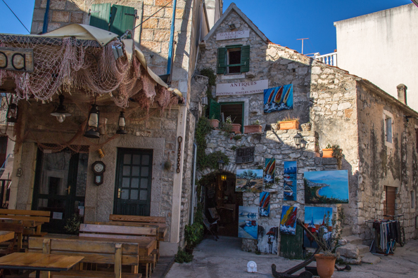 Souvenir shop and traditional konoba restaurant in the old town of Vodice in Croatia