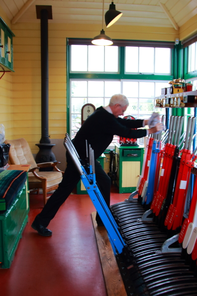 Roger Peperell manning the signal box at Corfe Castle Station in Dorset