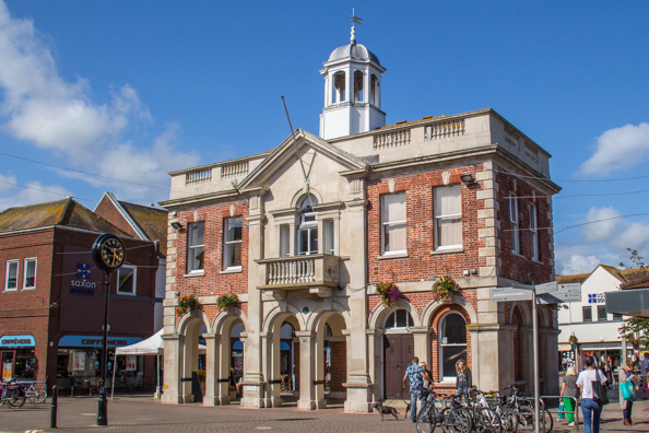 The old Town Hall in front of Saxon Square in Christchurch, Dorset UK