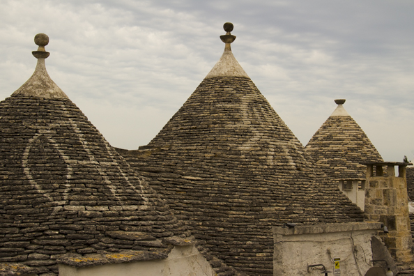 Symbols on trulli roofs in Alberobello, Puglia, Italy